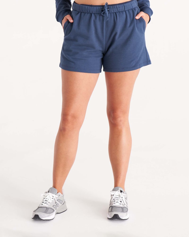 Front of a model wearing a size 5X The Sweat Short in Midnight by The Standard Stitch. | dia_product_style_image_id:304926